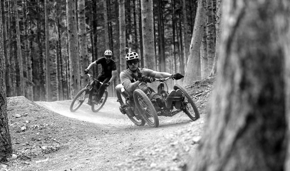 Riders on a purpose-built mountain bike trail